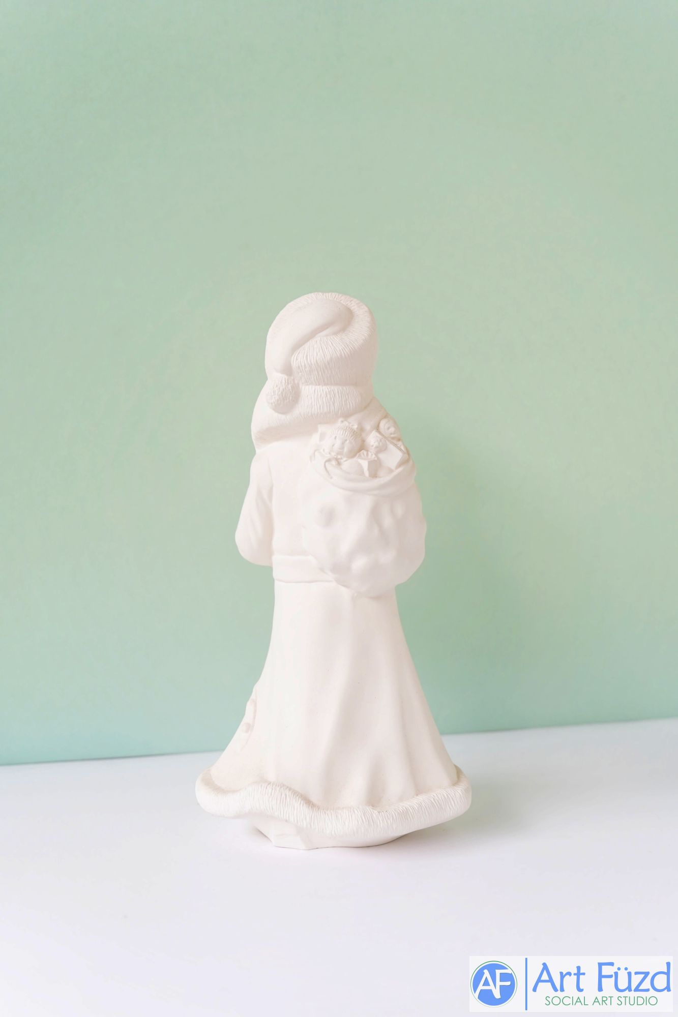 *Medium Vintage Santa in Winter Hat and Cuffed Boots with Toy Sack Figurine ~ 4.75 x 4 x 9.25