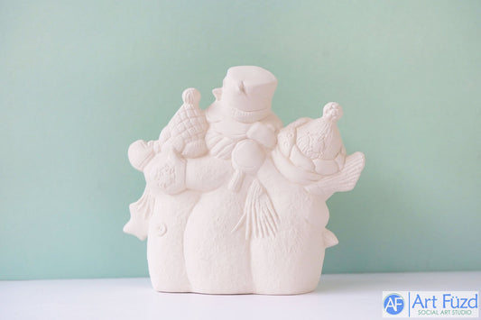 Three Snowman People Huddled Together holding Tree Sideways with Large Star on Right Side Snowman ~ 8.25 x 3.5 x 7.25