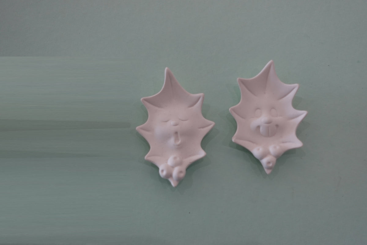 Bundle:  2 holly leaf faces (assorted) ($28)