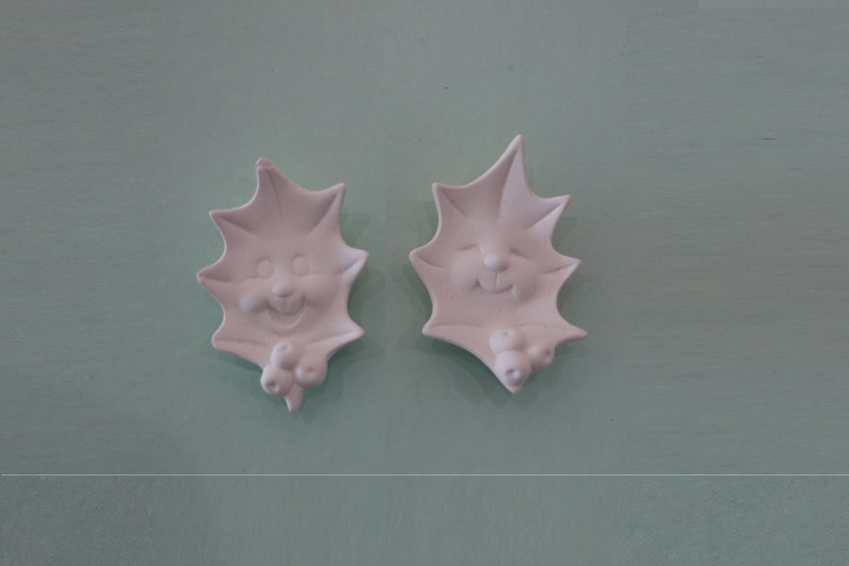 Bundle:  2 holly leaf faces (assorted) ($28)
