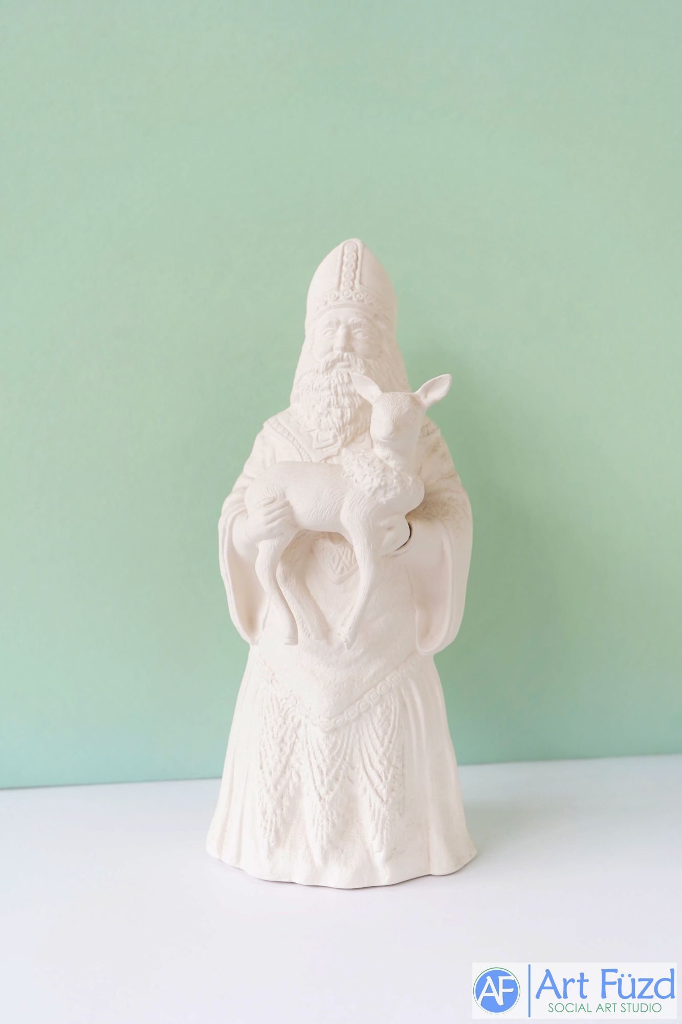 *Medium Vintage Santa in Triangular Detail Coat and Hat holding Small Reindeer Figurine ~ 5 x 4.5 x 10.75