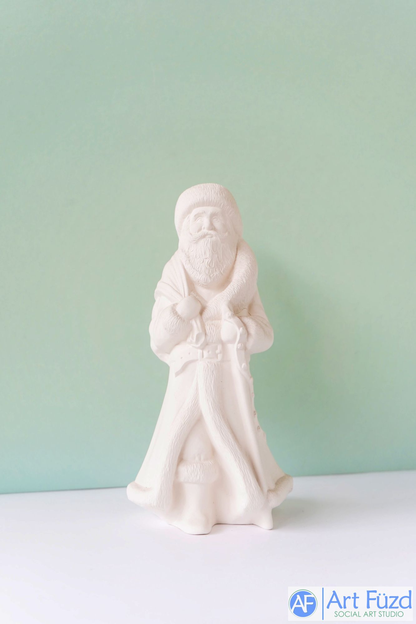 *Medium Vintage Santa in Winter Hat and Cuffed Boots with Toy Sack Figurine ~ 4.75 x 4 x 9.25