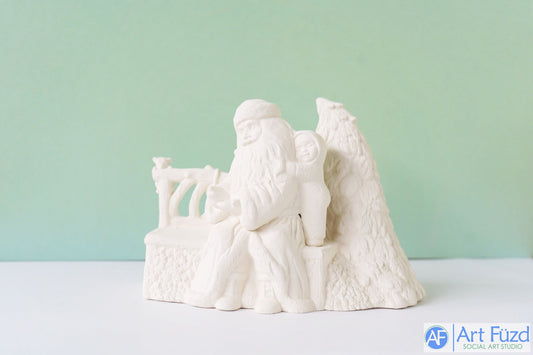 Medium Santa and Snowbaby Sitting on Bench with Tree ~ 8.75 x 5.5 x 6